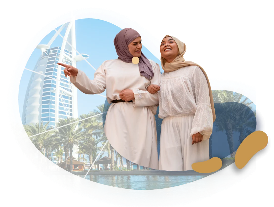 Travellers enjoying Dubai in front of the Burj Al Arab