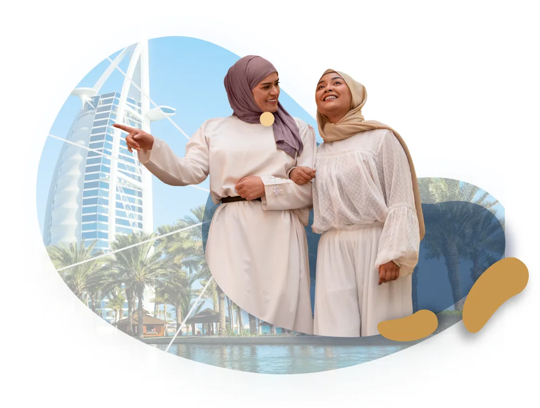 Travellers enjoying Dubai in front of the Burj Al Arab